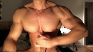 Bodybuilder flexing, oiling and masturbating